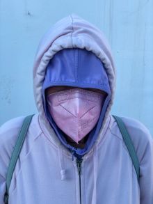 Kieran wearing her pink mask on a cold day Malaga